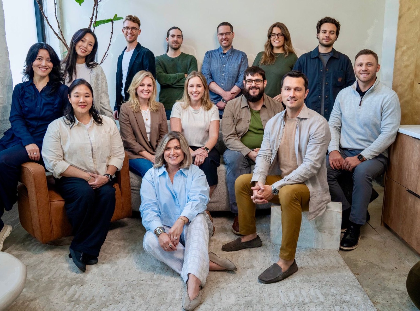 The Arro Labs team, seated and standing together in the studio
